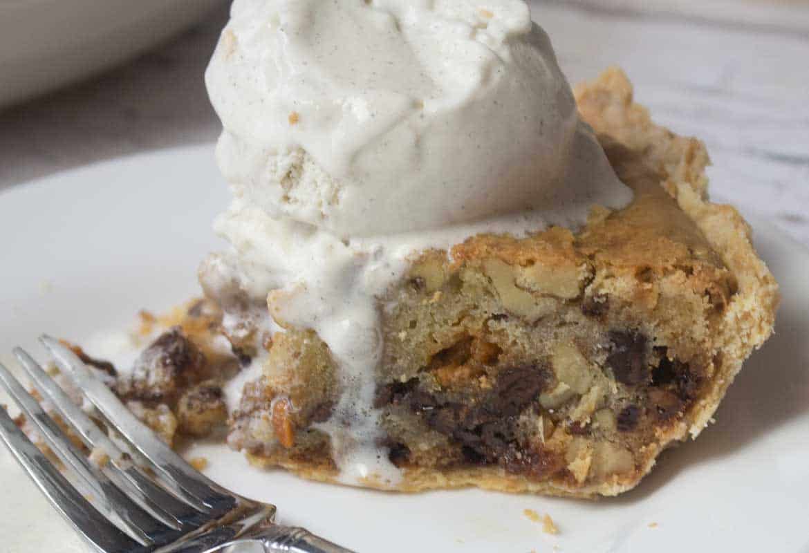slice of toll house cookie pie with ice cream