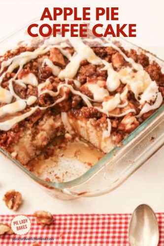overhead shot of apple pie coffee cake in a square glass pan with a slice removed showing caramel sauce and apple juices