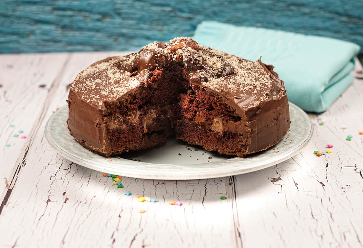 This Chocolate Fudge Cake is an easy recipe that's perfect for those "I MUST HAVE CHOCOLATE!" kinda days! Covered in yummy chocolate butter cream of course!