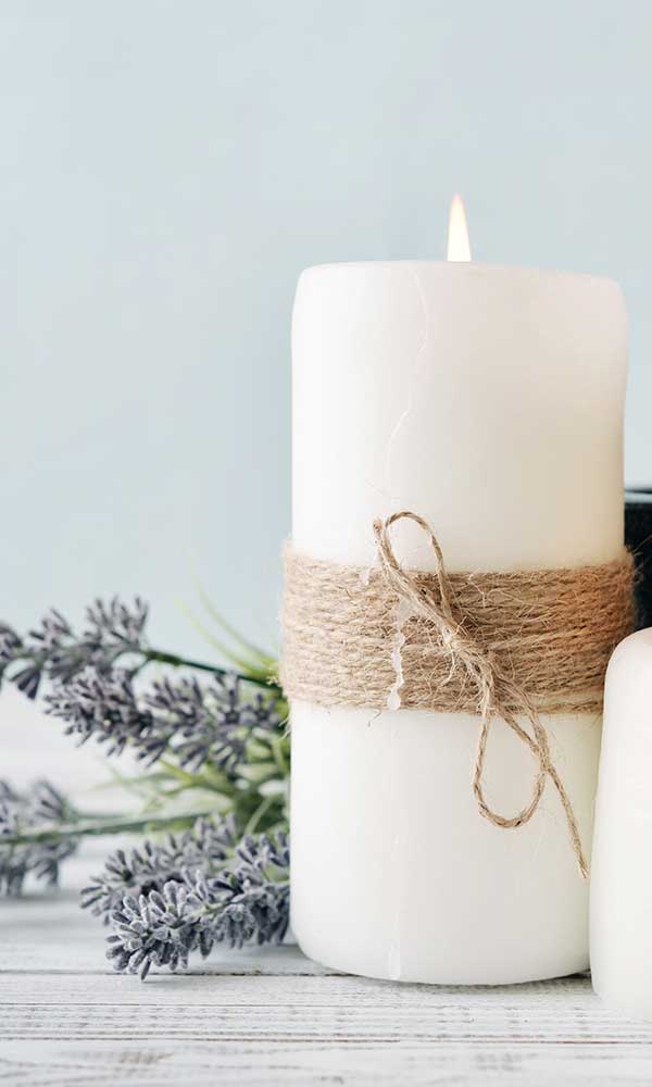 White candles, ties with jute and sprigs of lavender