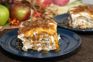 slice of apple pie cheesecake lasagna on blue plate