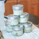 stack of small mason jars with sous vide egg bites inside