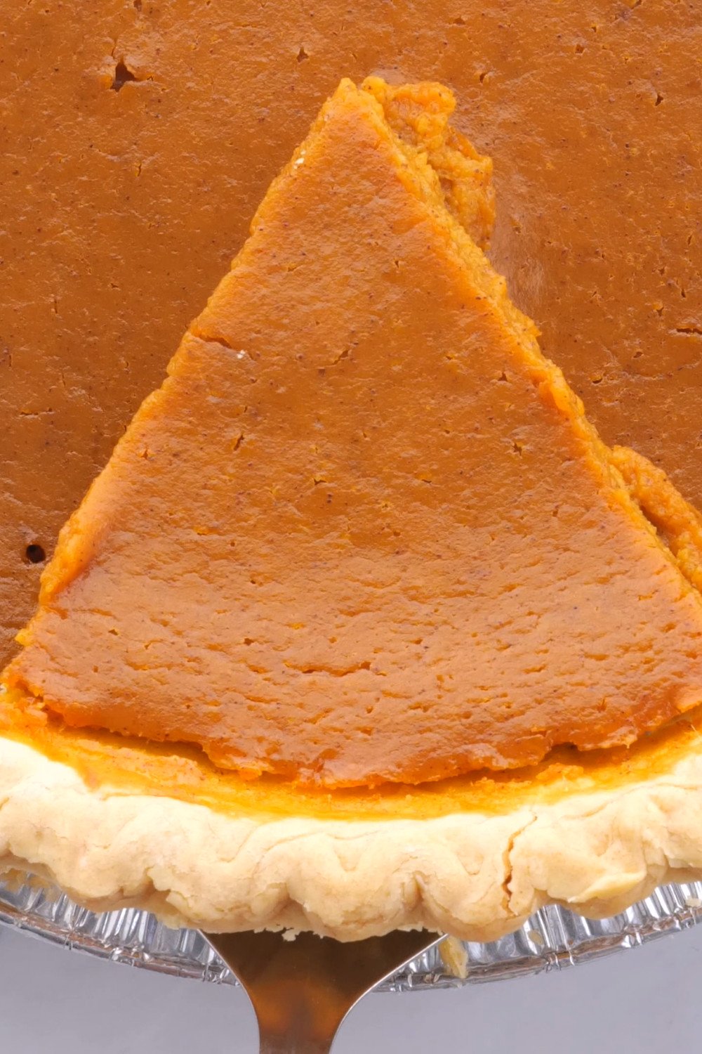 closeup view of pumpkin pie slice