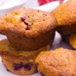 stack of mixed berry muffins feature
