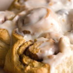 baked cinnamon rolls smothered in glaze
