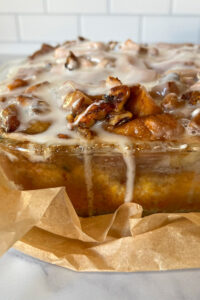 close up of glaze dripping over the side of the prepared pan