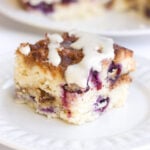 piece of blueberry coffee cake on a white plate