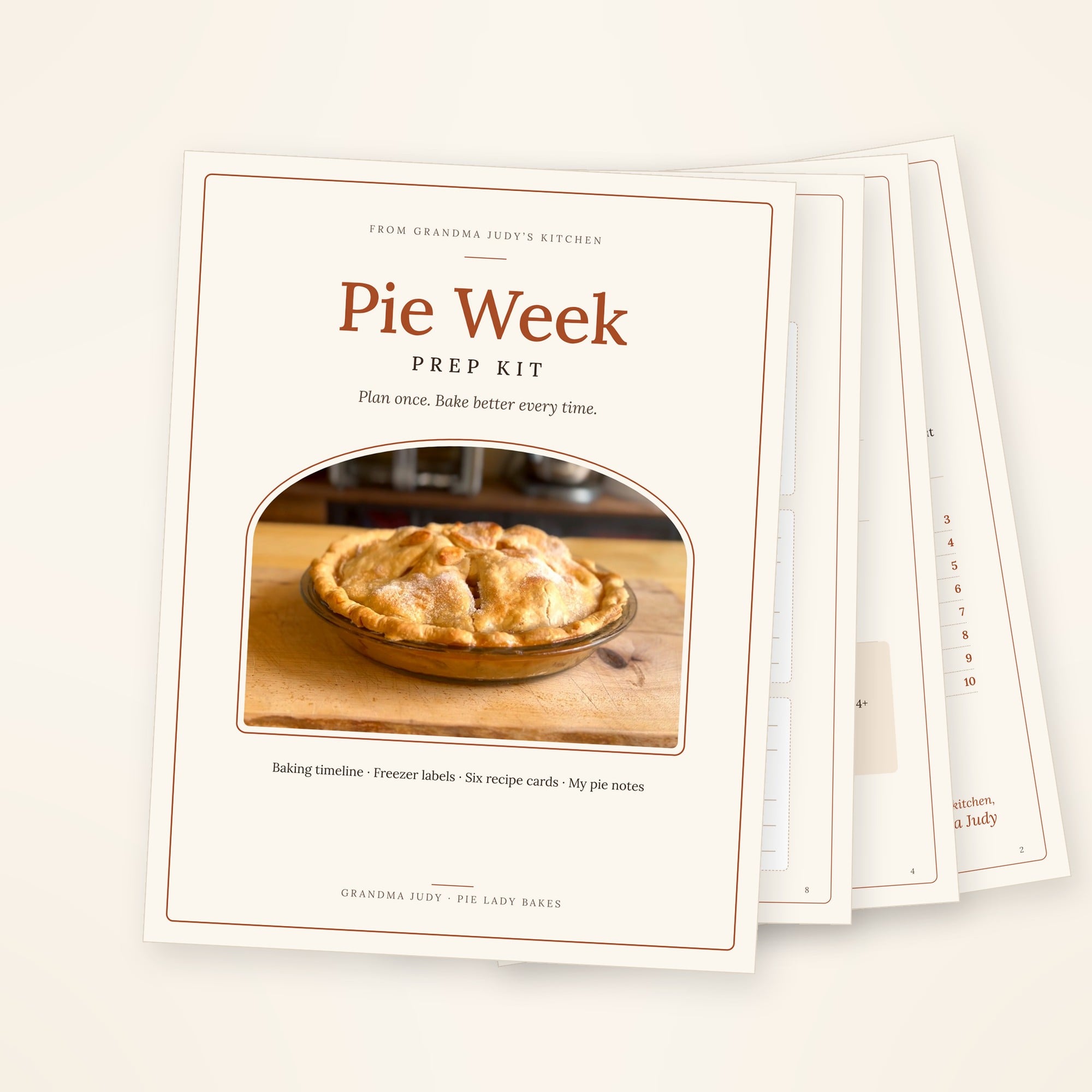 Pie Week Prep Kit booklet titled “From Grandma Judy’s Kitchen” featuring an image of a baked pie, with text listing baking timeline, freezer labels, recipe cards, and pie notes.